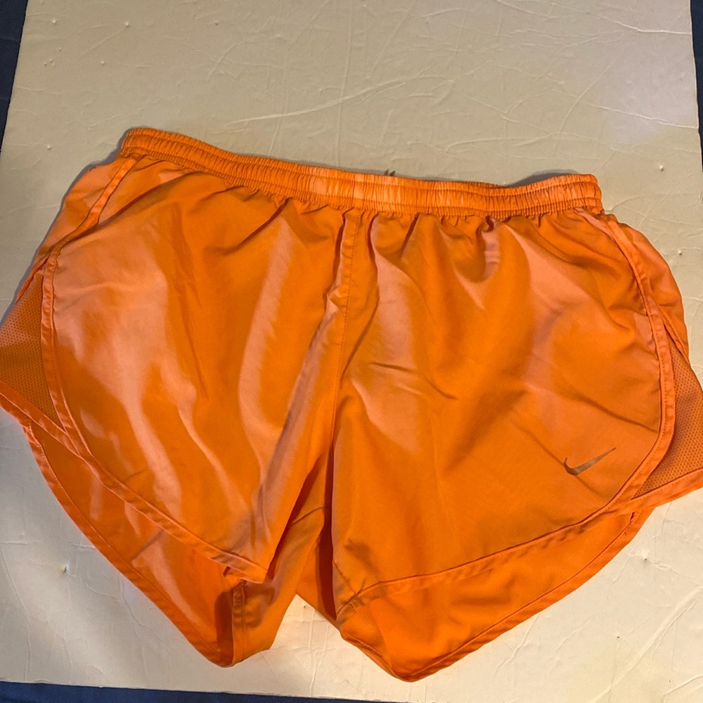Nike Orange Athletic Shorts Lightweight Elastic Fit. Back zipper pocket.